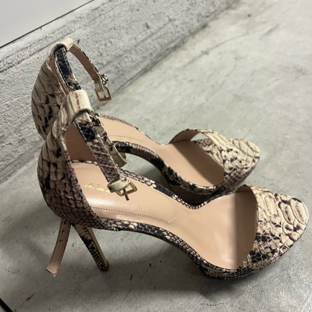 Like New Aldo Snakeskin pumps worn one time, like new Size 8. Purchased at Aldo